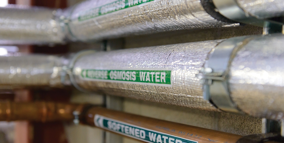 Close up photo of piping to RO system