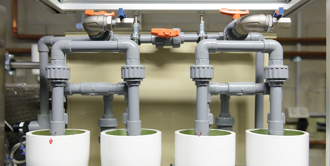 Close up of piping on RO water treatment system in plant room of hospital