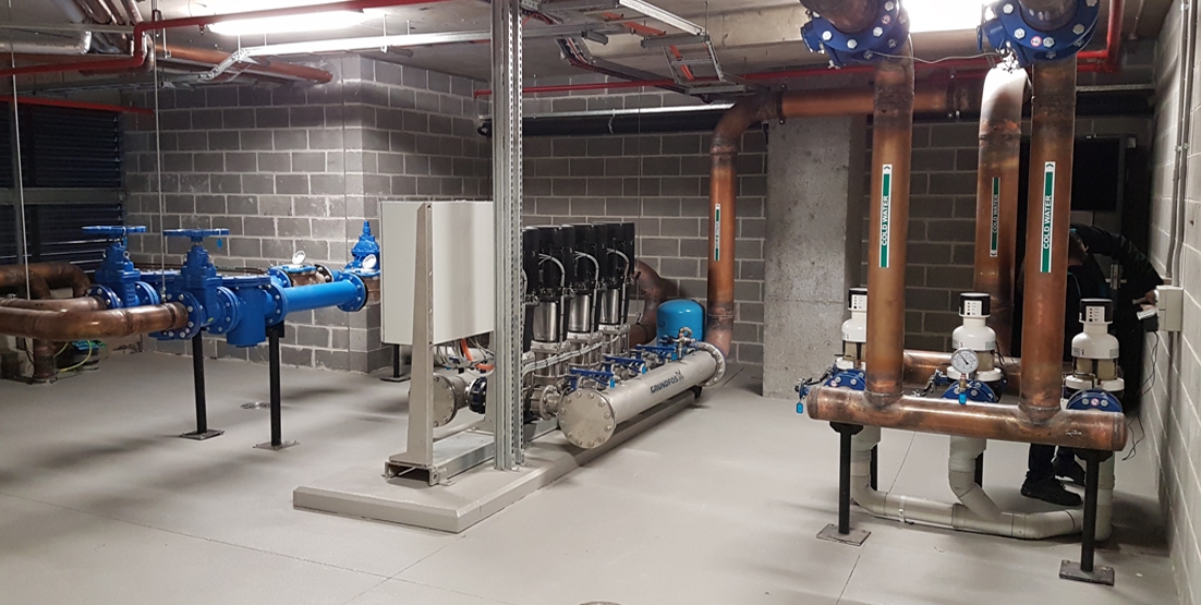 international-convention-centre-judo-skan-3 photo of complete water system and piping work against wall of plant room