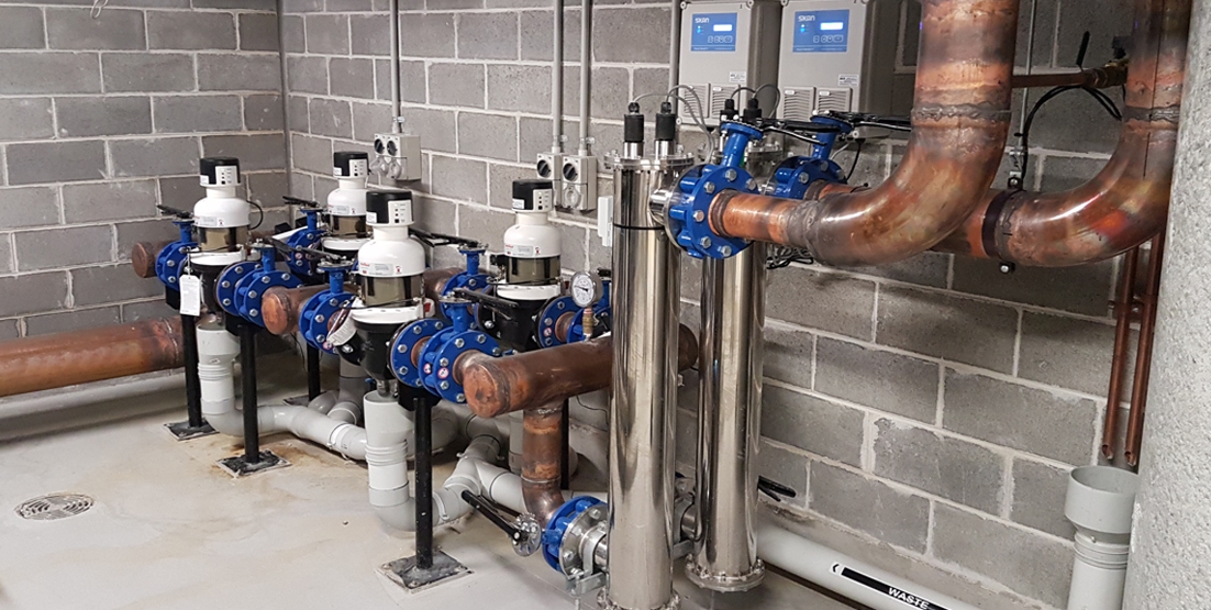 international-convention-centre-judo-skan-2 water system against wall of plant room and piping work