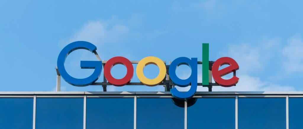 Google sign on the top of a building