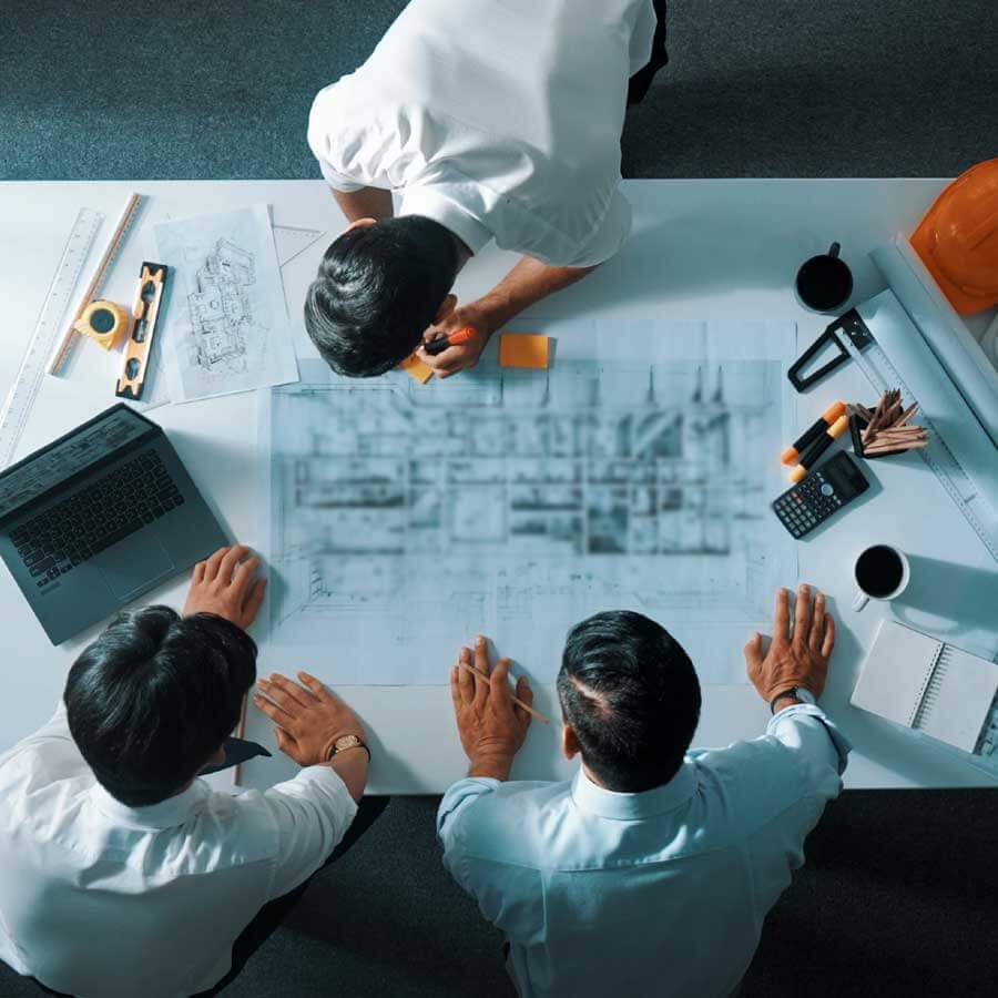 Engineers designing a plant room for a hospital